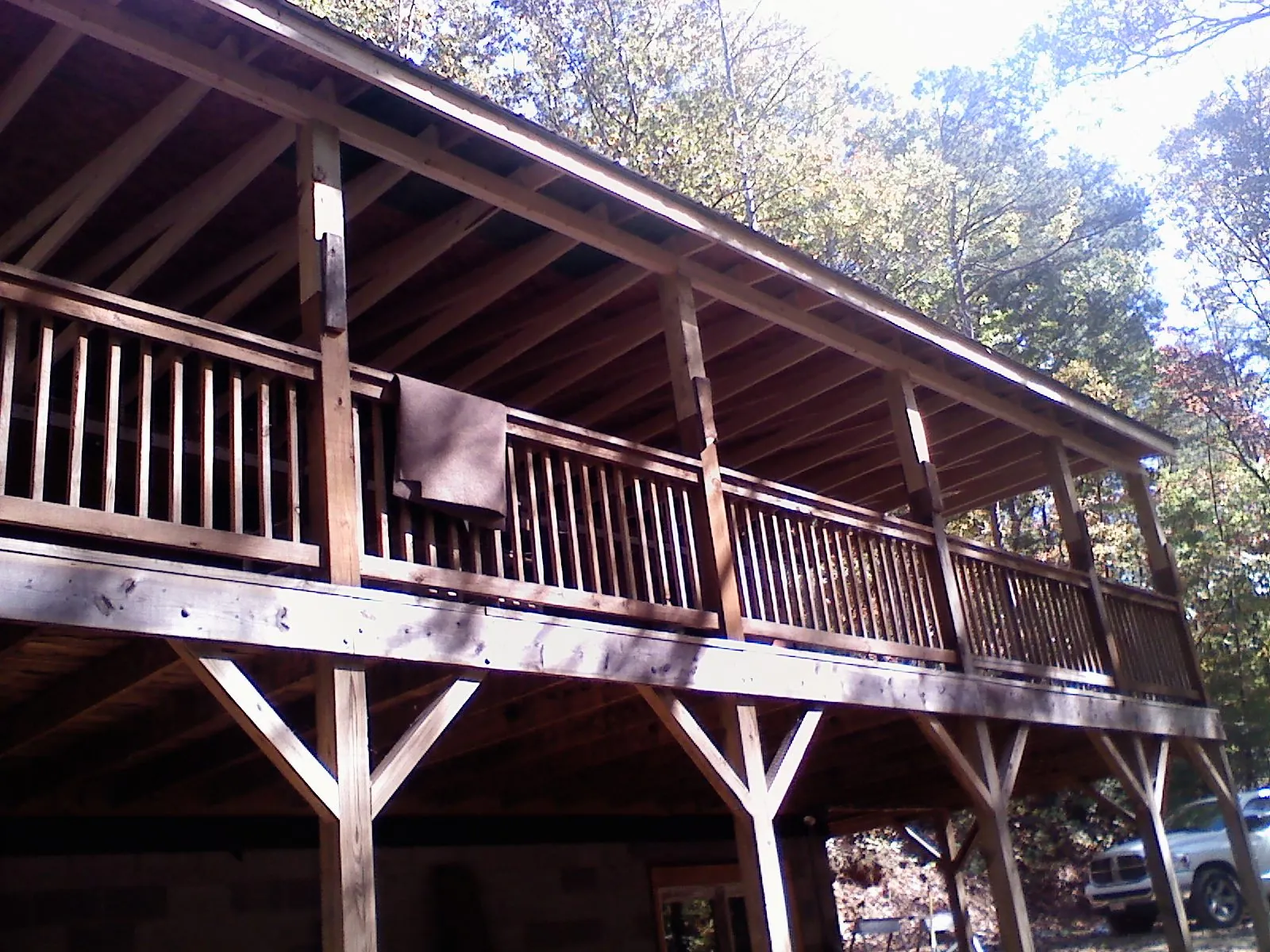 Timber framing under a new elevated porch and deck — Roof Leak Repair in Hesperia by Roofing Brothers